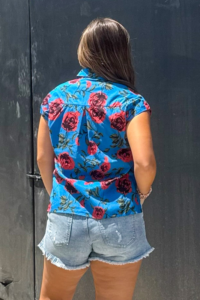 Blue button up top with red roses back
