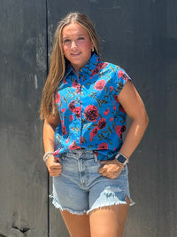 Blue button up top with red roses
