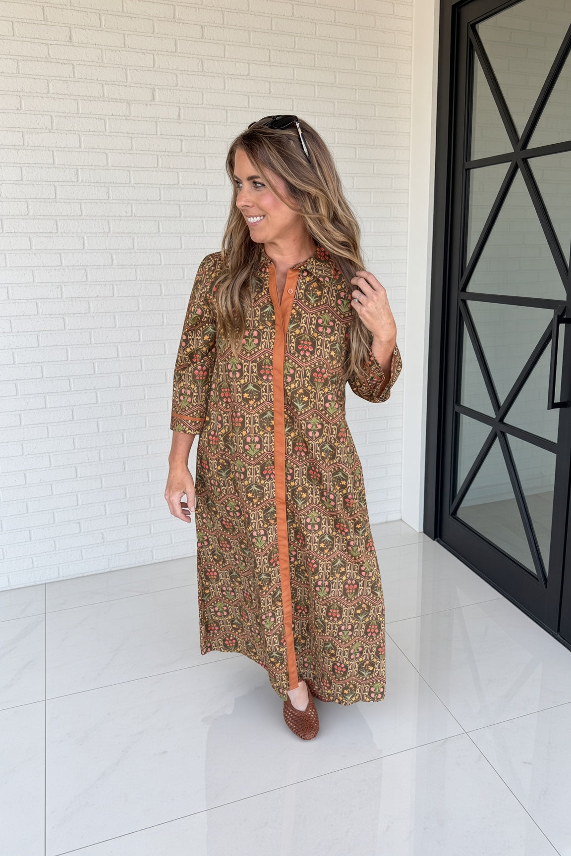 Woman wearing Jodifl maxi dress with brown flats