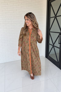 Woman wearing Jodifl maxi dress with brown flats