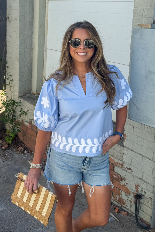 Strut and Bolt Light Blue Top with White Flowers