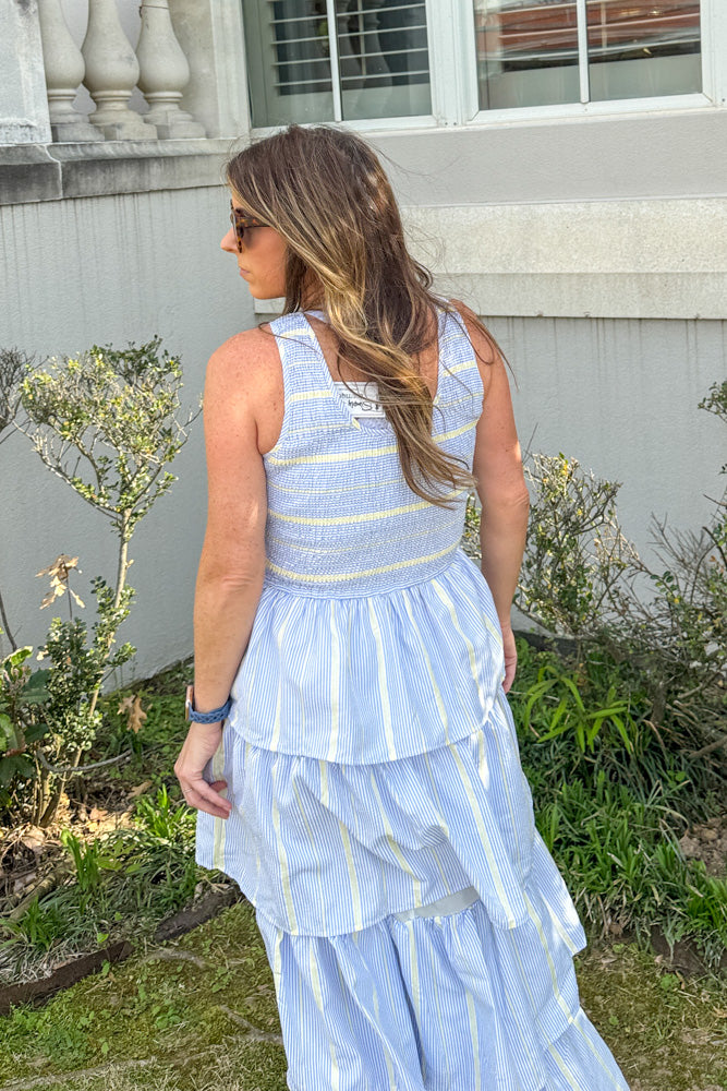 Back view of First Class Dreamin blue yellow tiered maxi dress by TCEC