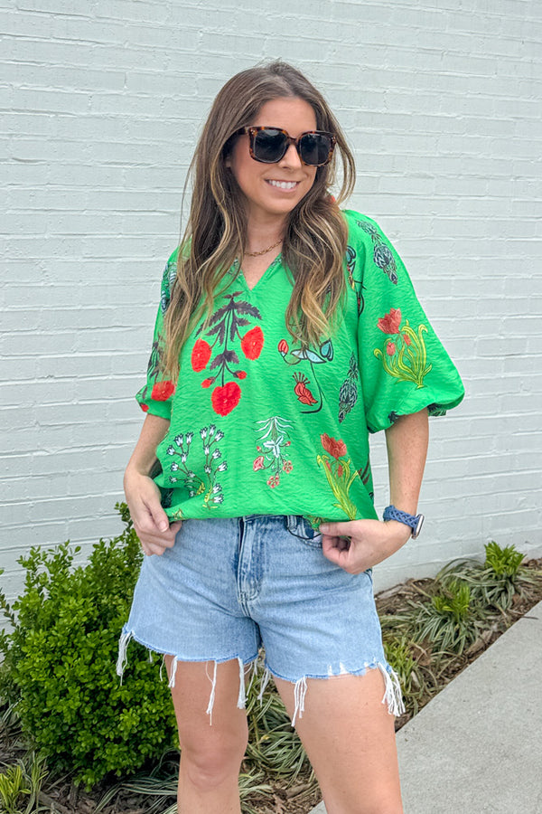 Bold And Beautiful floral top in green by Umgee with bright floral print, V-neck and puff sleeves