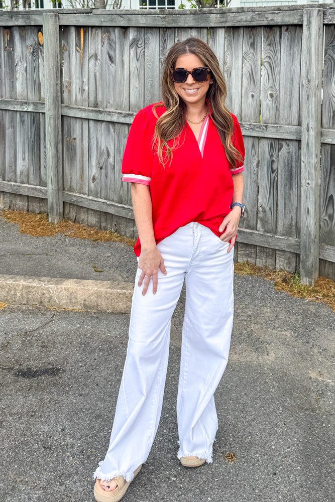 She's Sporty contrast trim top in red by Umgee with pink and white trim