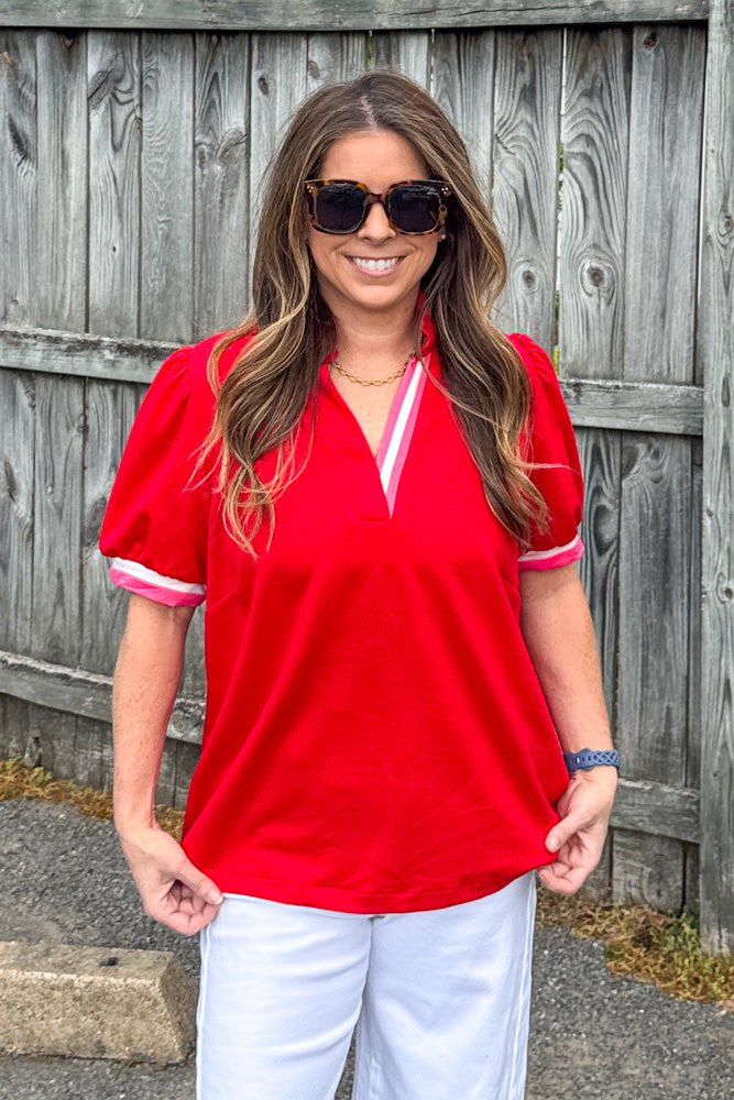 Close up of pink and white contrast trim on She's Sporty red scuba top by Umgee