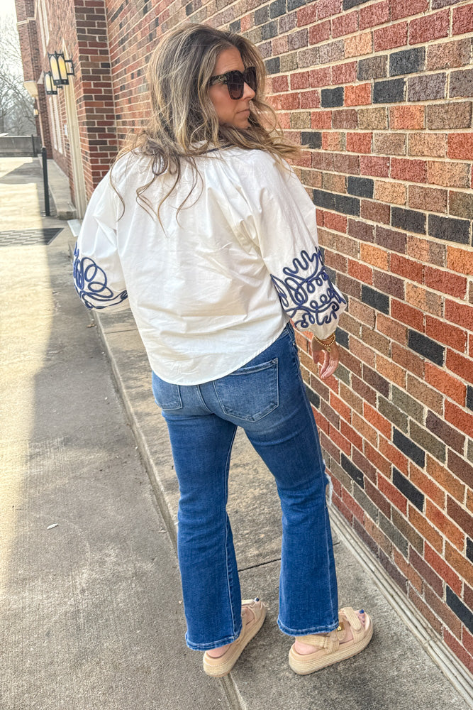 White Top WIith Blue Embroidered Sleeves Back