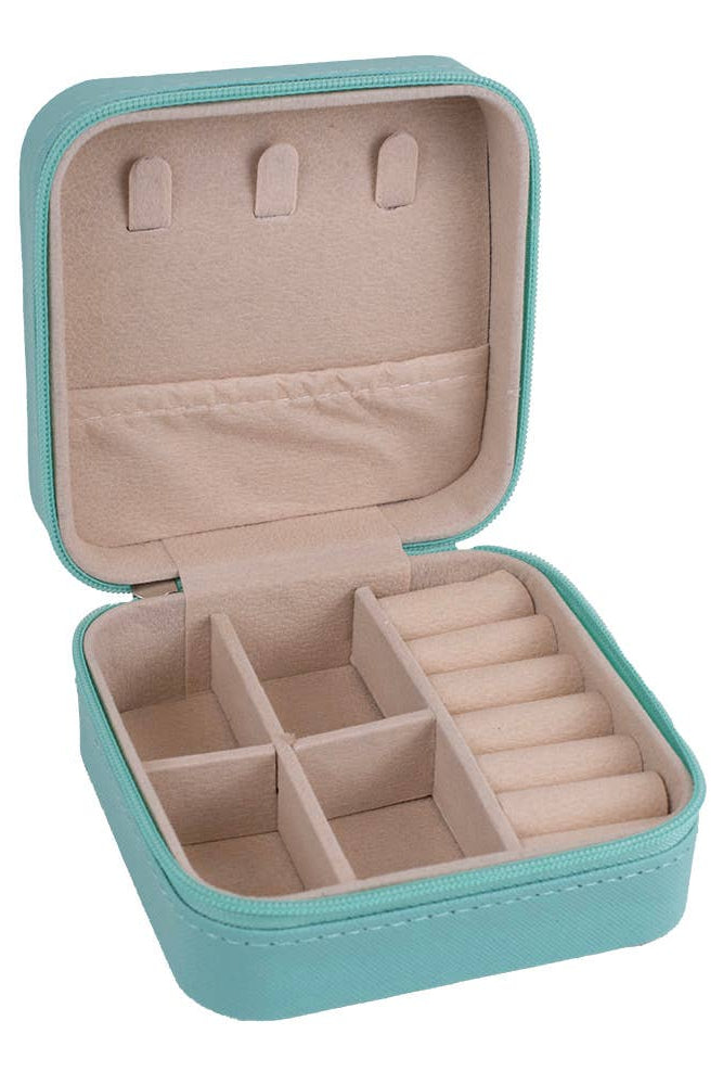 Turquoise jewelry box with beige interior on a white background