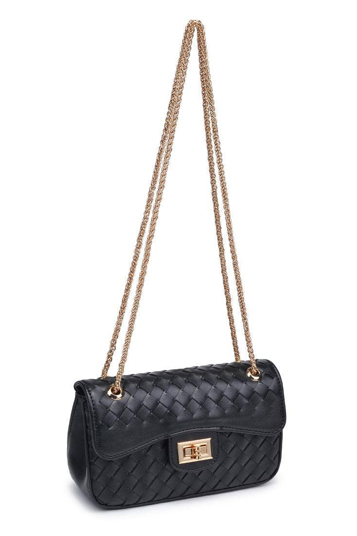Black quilted handbag with gold chain strap on a white background
