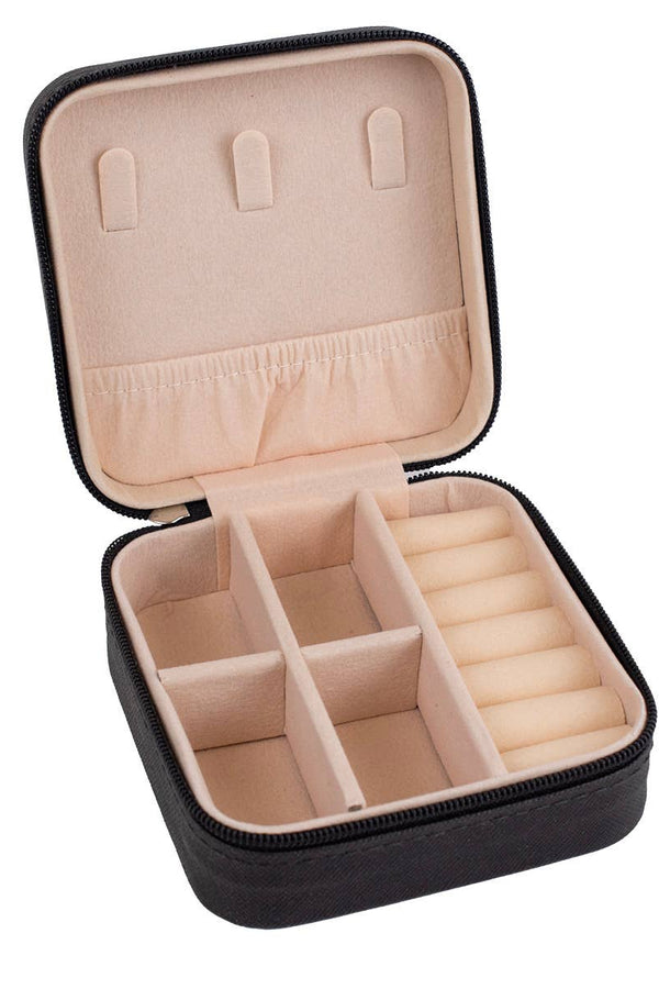 Black jewelry case with beige interior on a white background